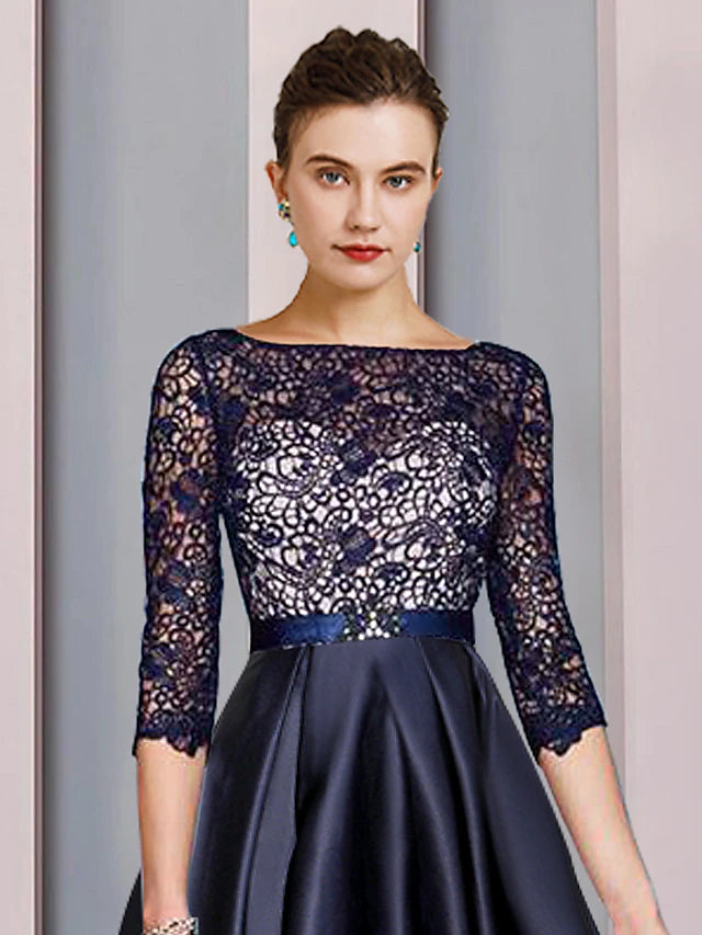 Back view of the A-Line satin lace Mother of the Bride dress with pleated details and sash.