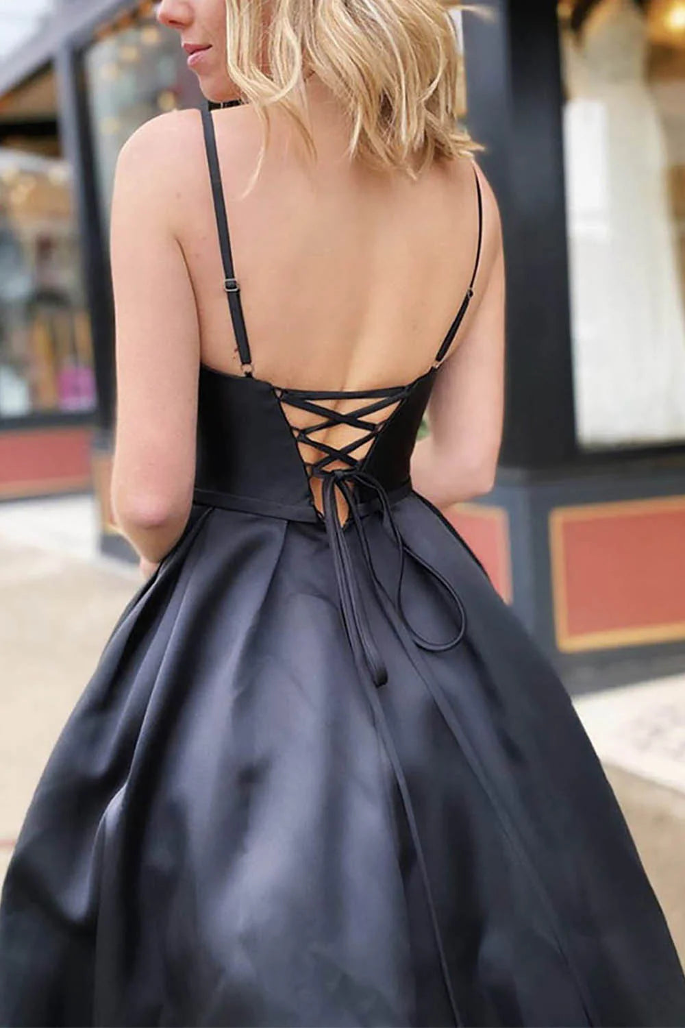 Full view of the A-line satin prom dress, showcasing its flowing ankle-length skirt.