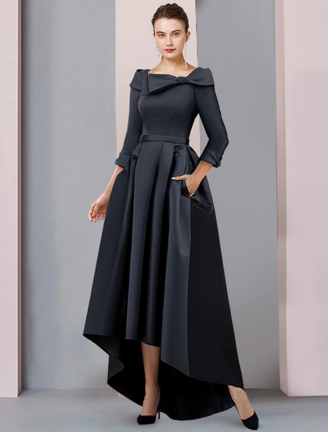 Elegant A-line satin tea length dress with scoop neck and 3/4 sleeves.