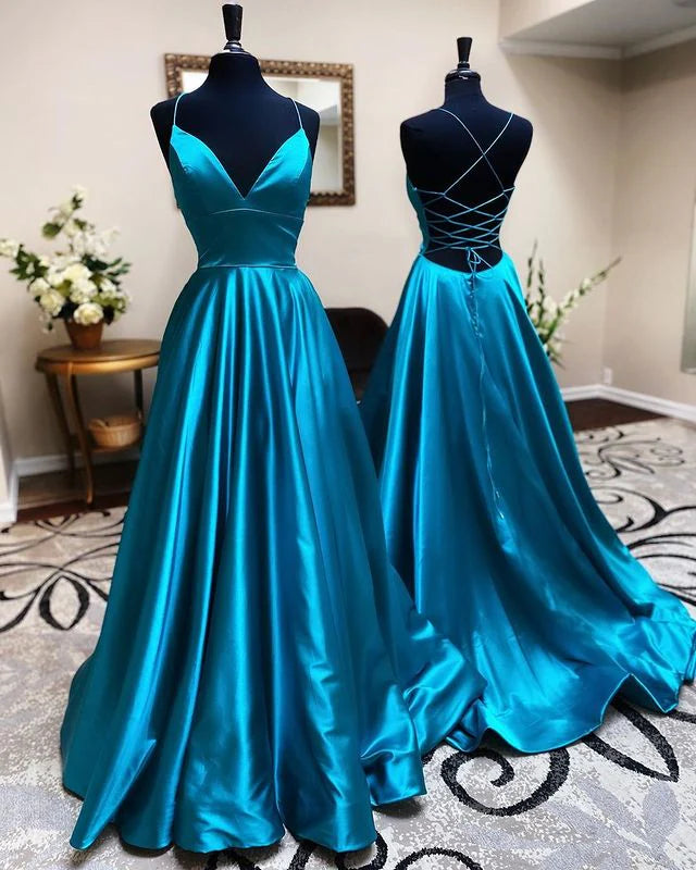 Elegant emerald green A-line satin prom dress with V-neck and spaghetti straps.