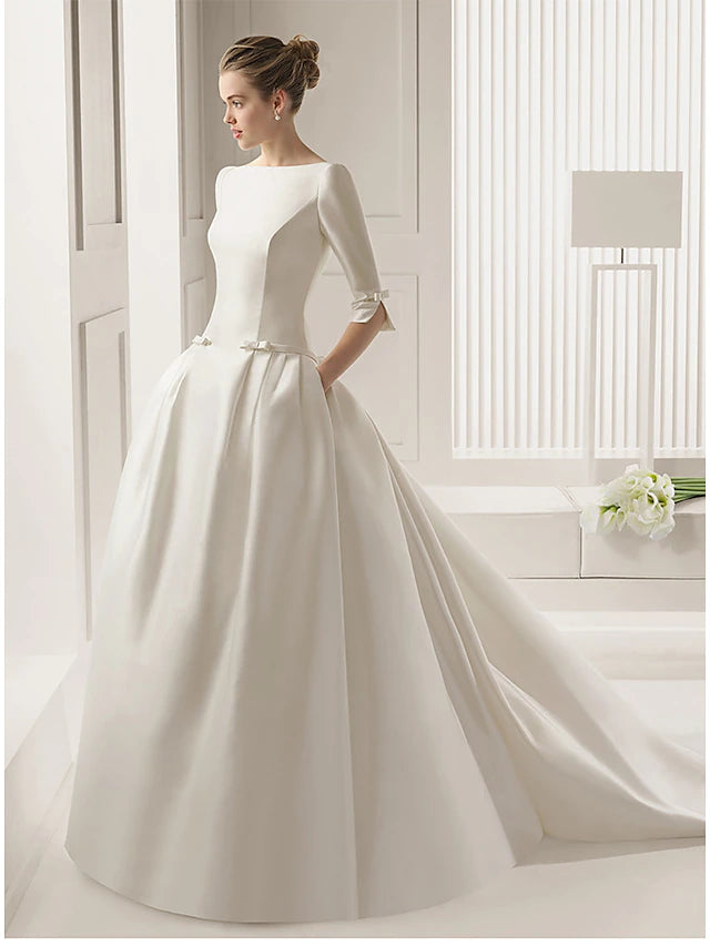 Elegant A-line satin wedding dress with half sleeves and scoop neck.