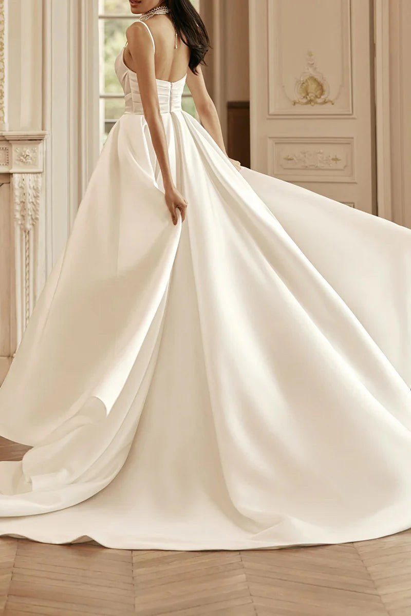 Back view of the A-line satin wedding dress, showcasing its flowing silhouette.