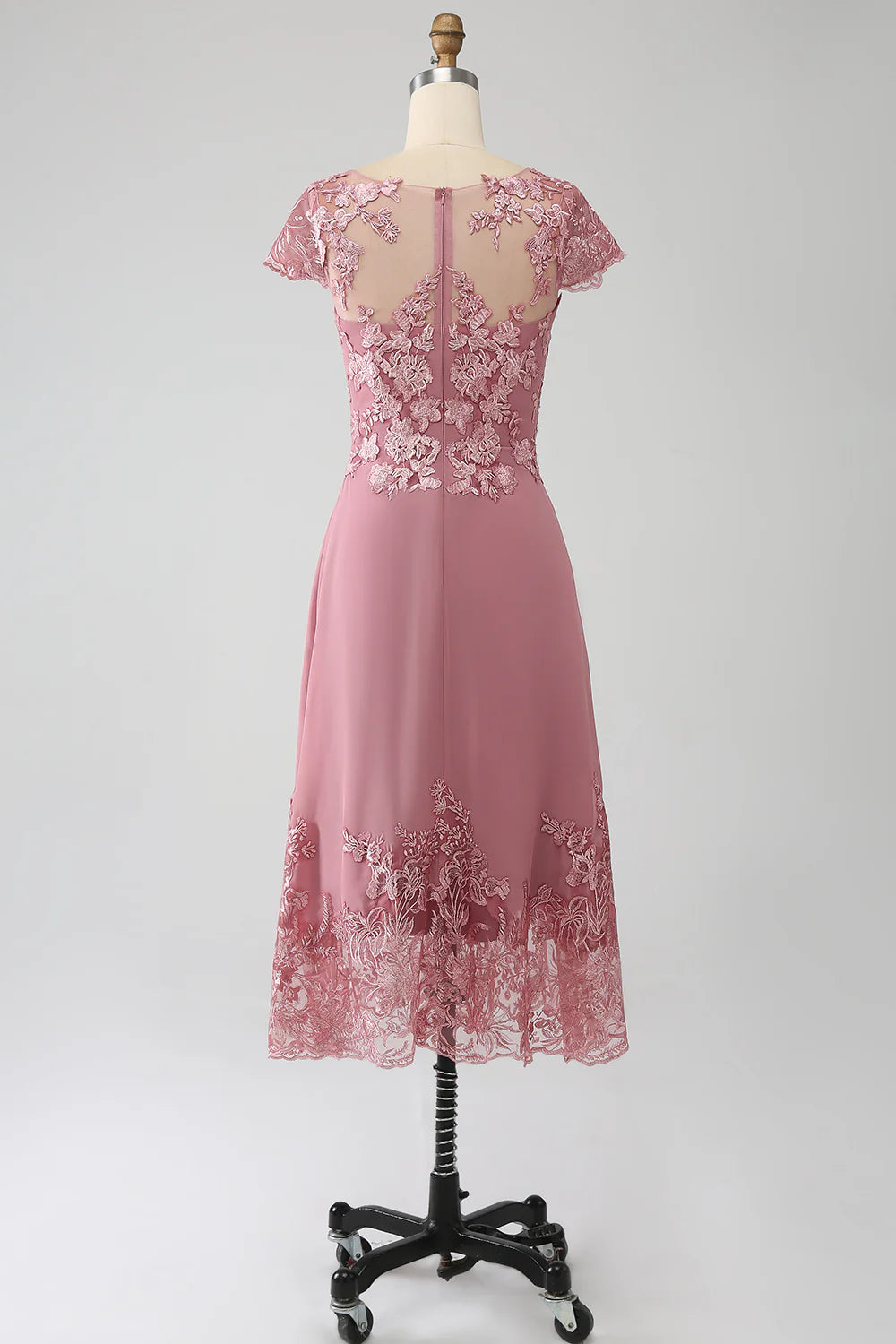 Back view of the sequined tea-length Mother of the Bride dress.