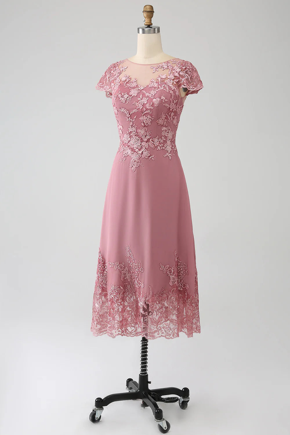 Side view of the dusty rose A-line gown with sparkling sequins.
