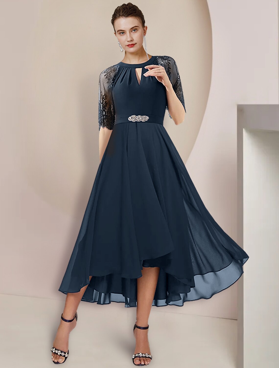 Elegant A-Line Mother of the Bride dress with scoop neck, 3/4 sleeves, high-low tea length hem, chiffon and lace fabric.