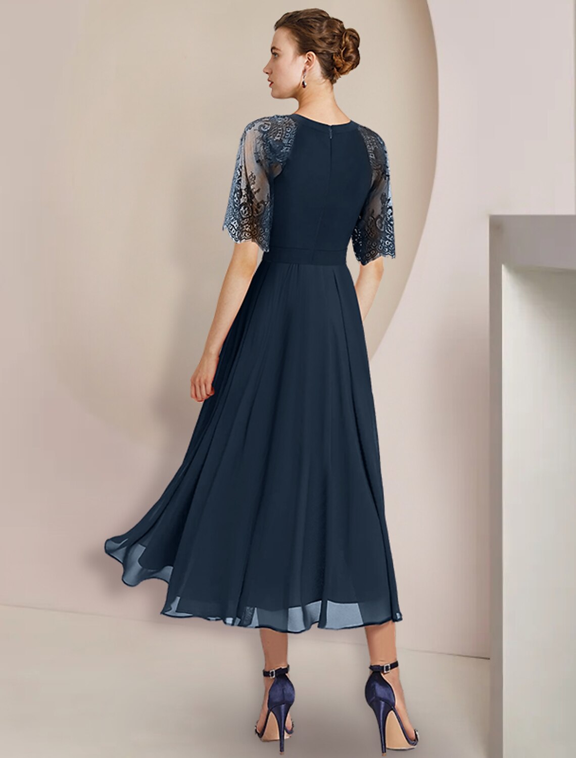Side view of the A-Line Mother of the Bride dress, highlighting the high-low hem and 3/4 sleeve length.