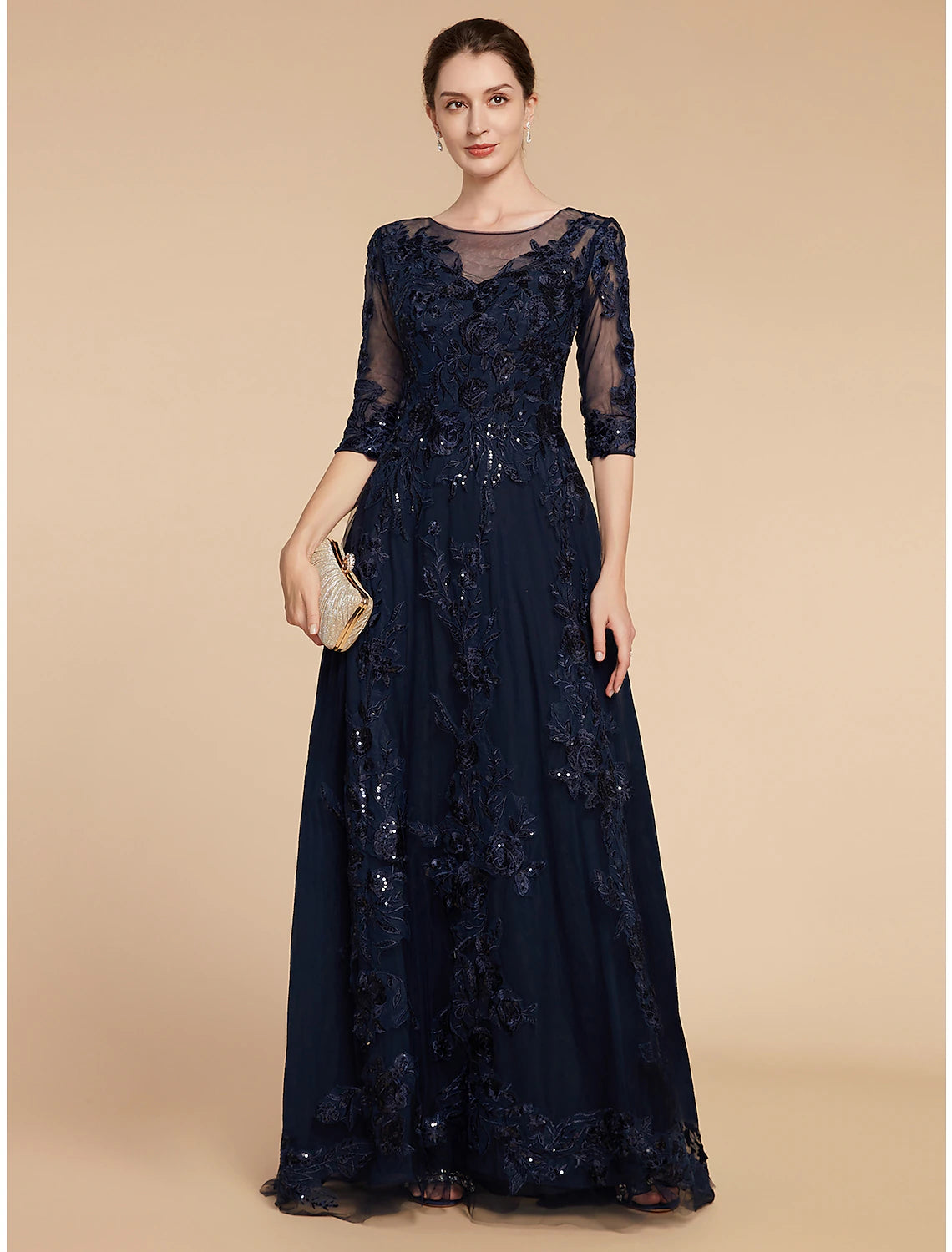 Elegant A-line mother of the bride dress with scoop neck and 3/4 sleeves.