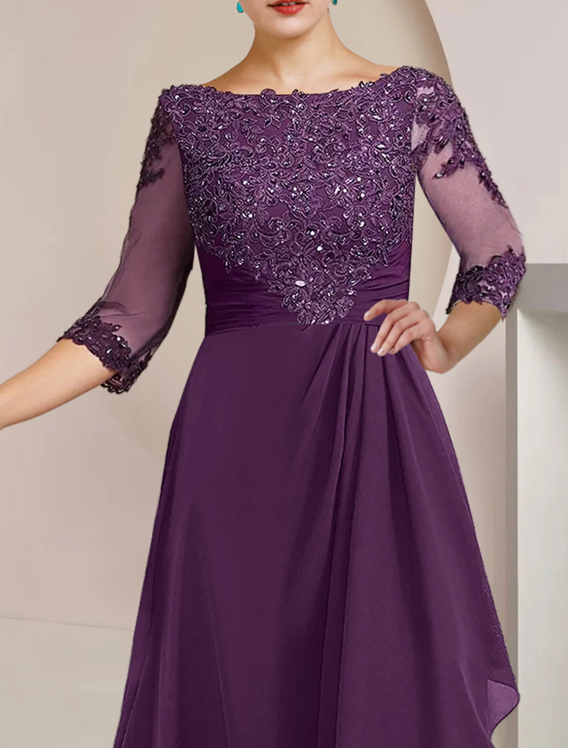 Side view of A-line wedding guest dress showing beading and sequin appliques.