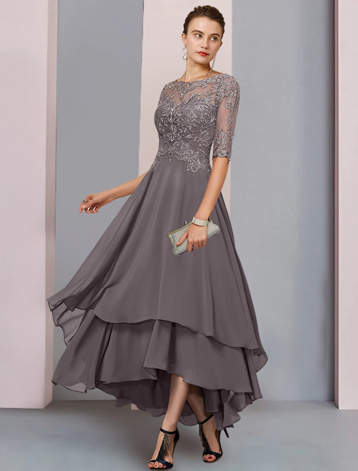 Elegant A-Line Mother of the Bride dress with scoop neck and 3/4 sleeves.