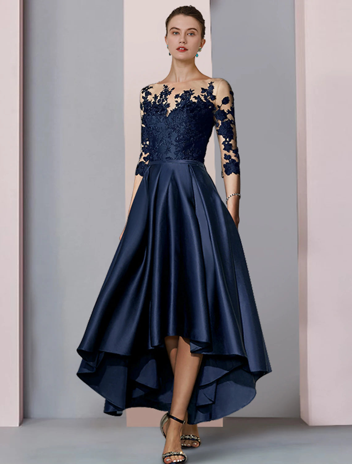 Side view of asymmetrical tea length wedding guest gown.