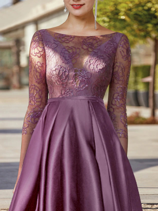 Side view of the high-low tea length formal gown.