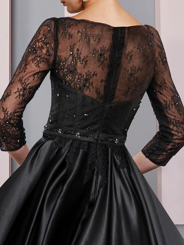 Side view of the formal Mother of the Bride gown, highlighting the lace bodice.