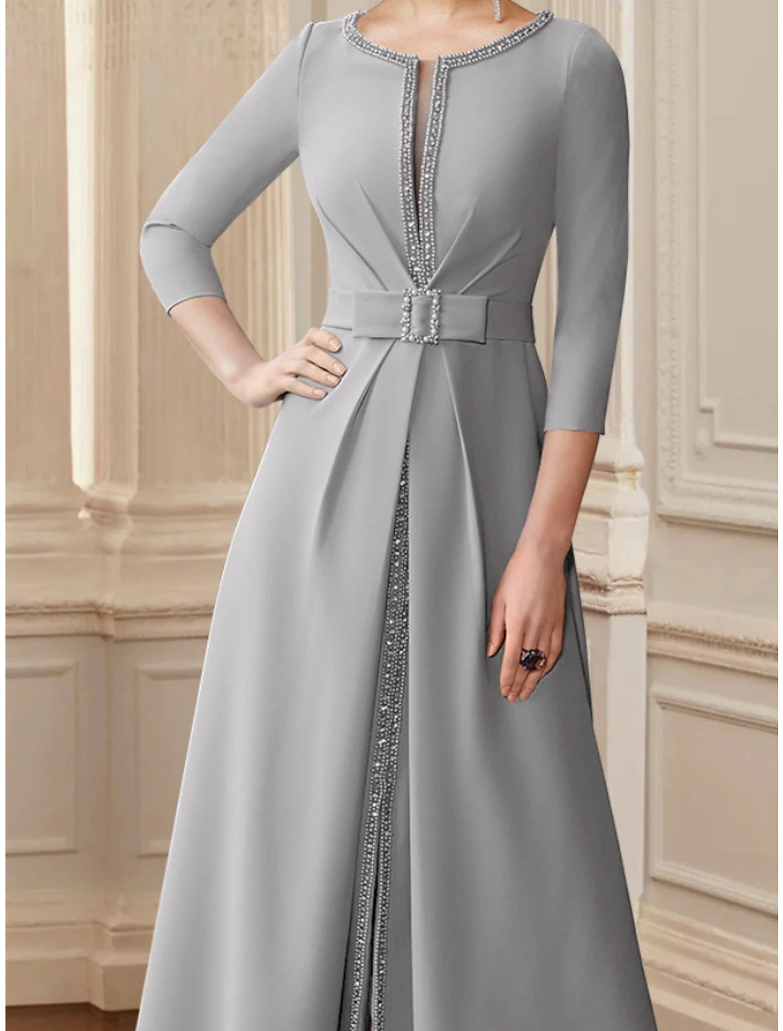 Tea length A-Line dress featuring sequin ruching and bow accents.