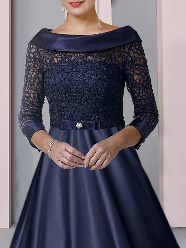 A-Line Mother of the Bride dress, tea length, featuring satin and lace details.
