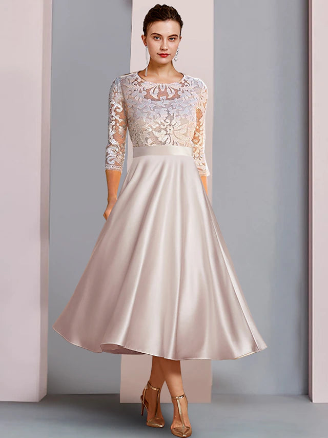 Elegant A-Line Mother of the Bride dress with scoop neck and 3/4 sleeves.