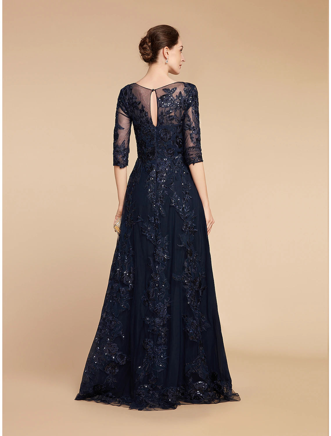 Back view of the A-Line chiffon lace formal gown.