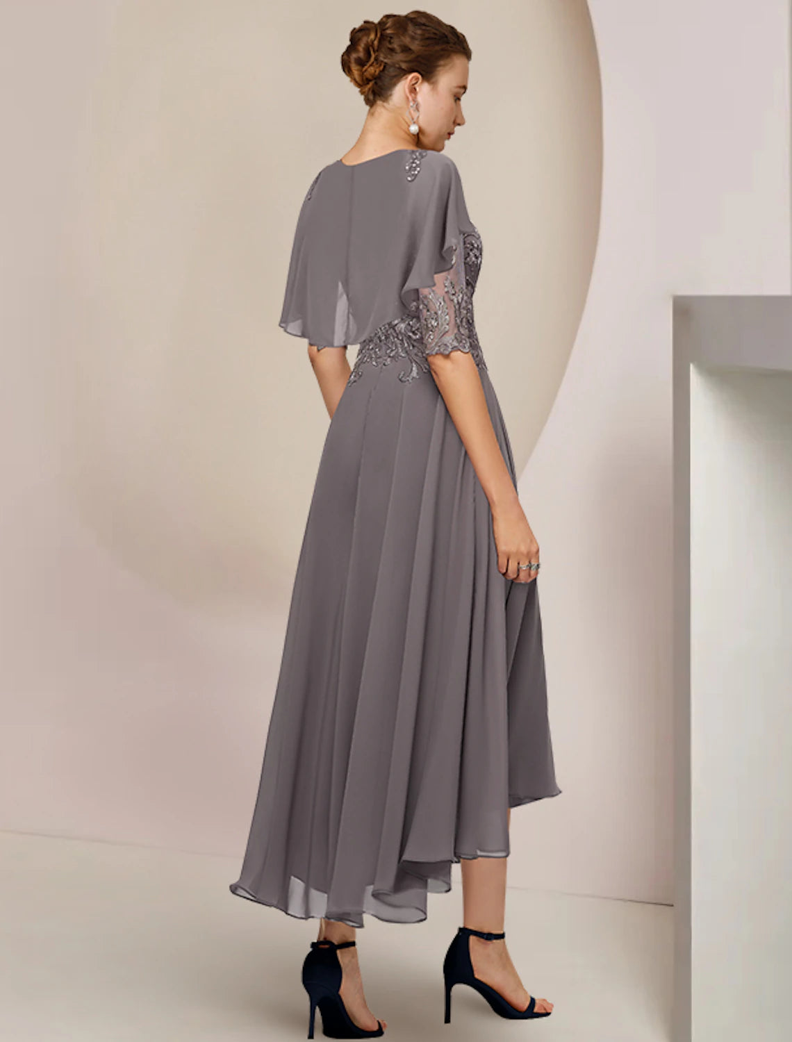 Side view of the A-line formal dress with delicate beading.