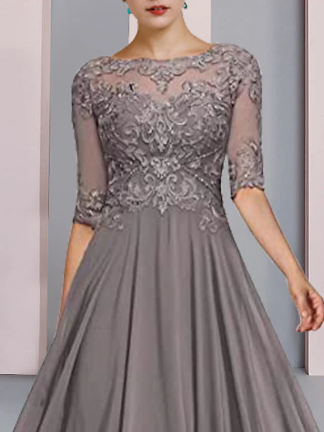 Close-up of the delicate lace and beading details on the formal dress.