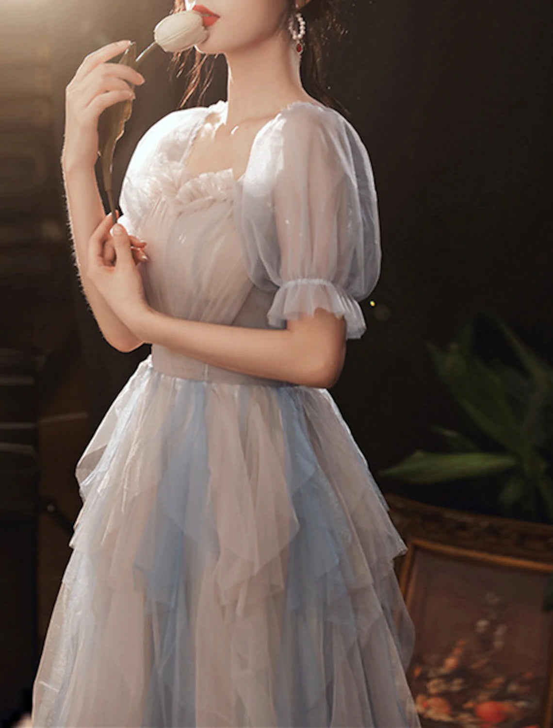 Model walking in the elegant half sleeve prom dress, showing movement.
