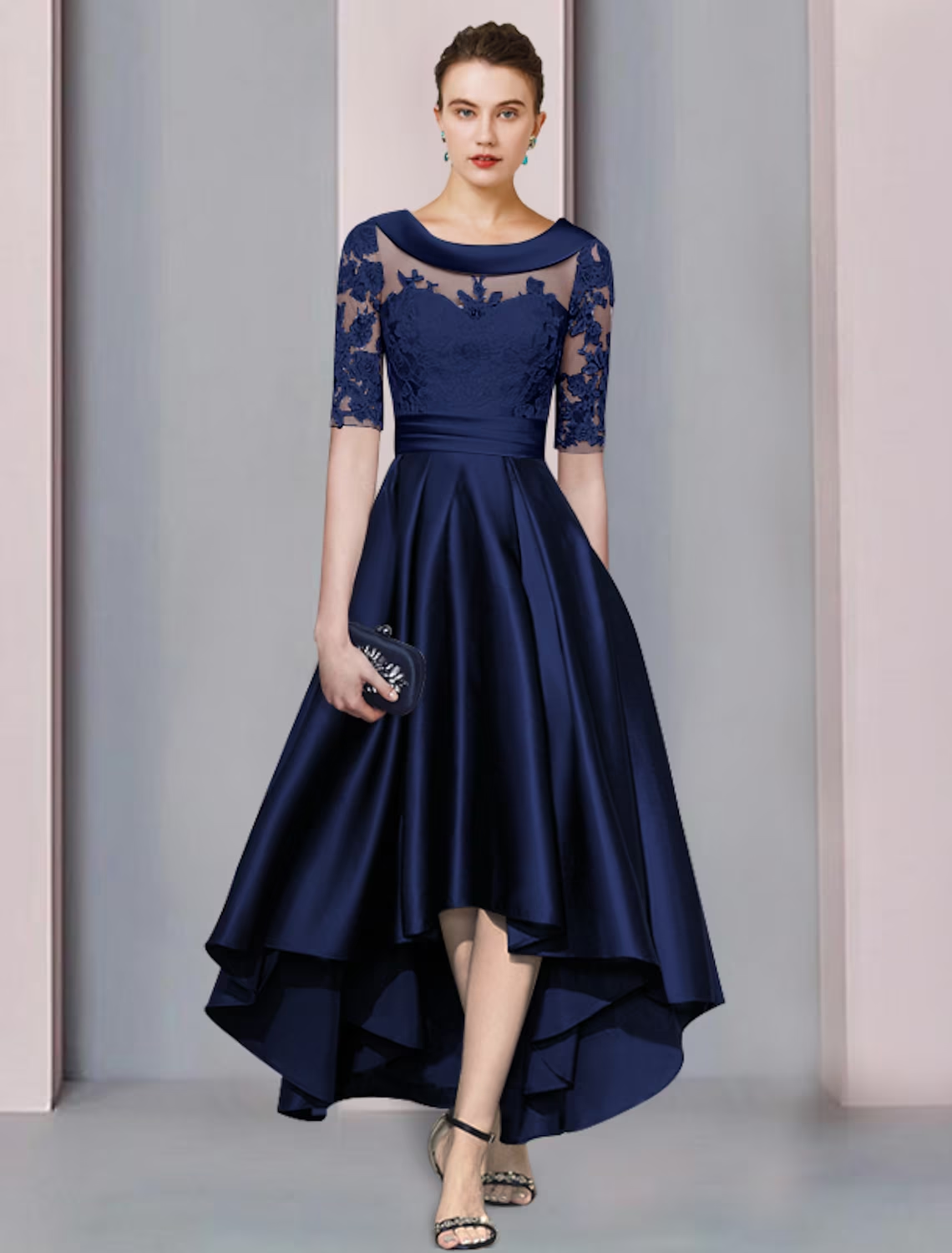 Back view of A-Line high-low tea length dress with satin and lace details.