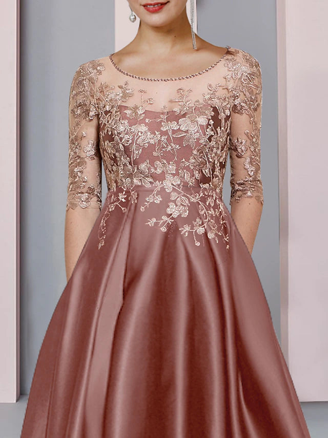 Back view of the A-Line Mother of the Bride dress, showing high-low hem and pleats.