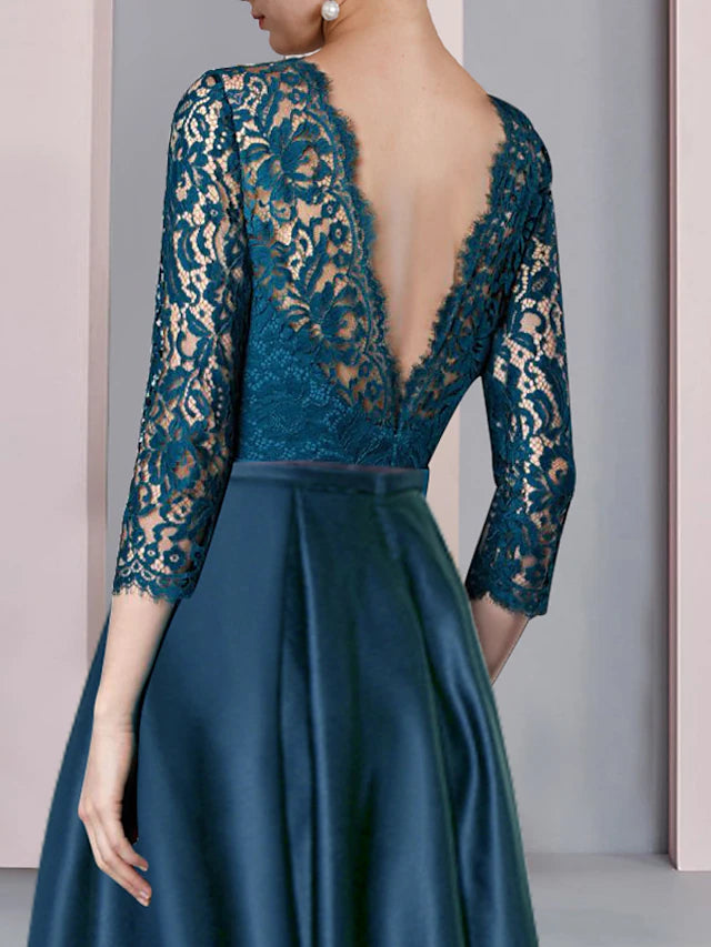 Back view of the A-Line formal dress, highlighting pleats and satin lace.