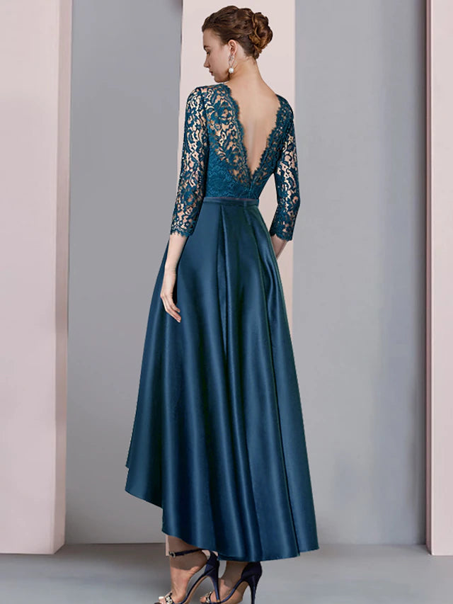 Close-up of the scoop neck and half sleeve on the elegant A-Line dress.