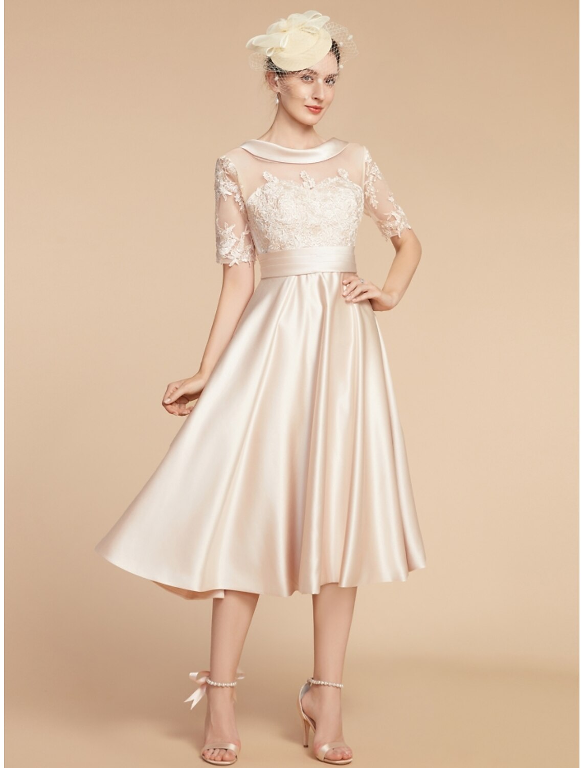 Full length view of the elegant A-line knee-length dress, highlighting its silhouette.