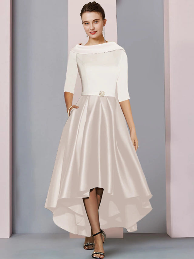 Elegant A-line satin high-low tea length dress with scoop neck and half sleeves.