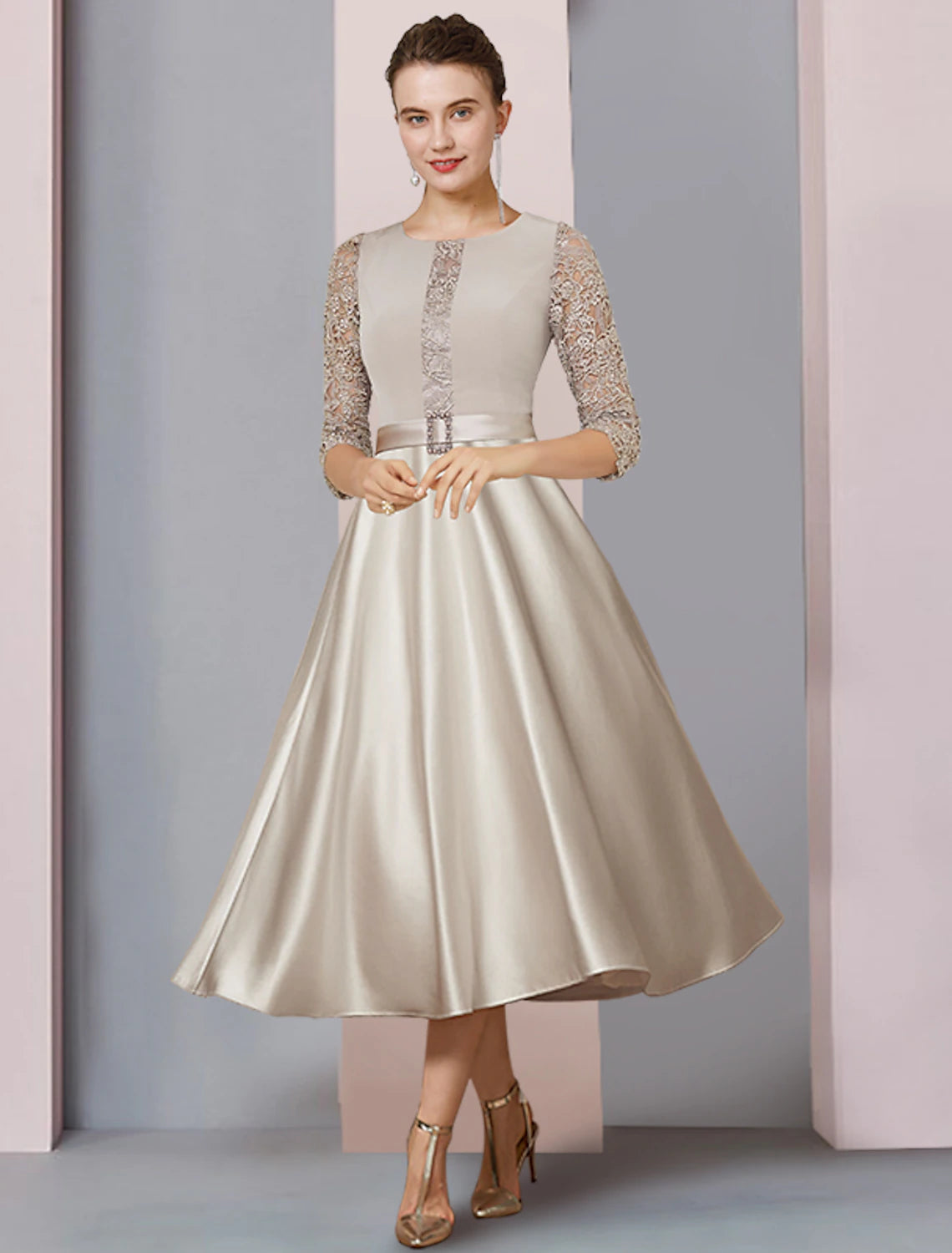 Elegant A-Line Mother of the Bride dress in satin and lace with a scoop neck, half sleeves, and crystal brooch.