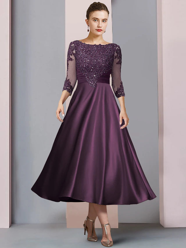 Elegant A-Line Mother of the Bride dress with scoop neck and half sleeves.