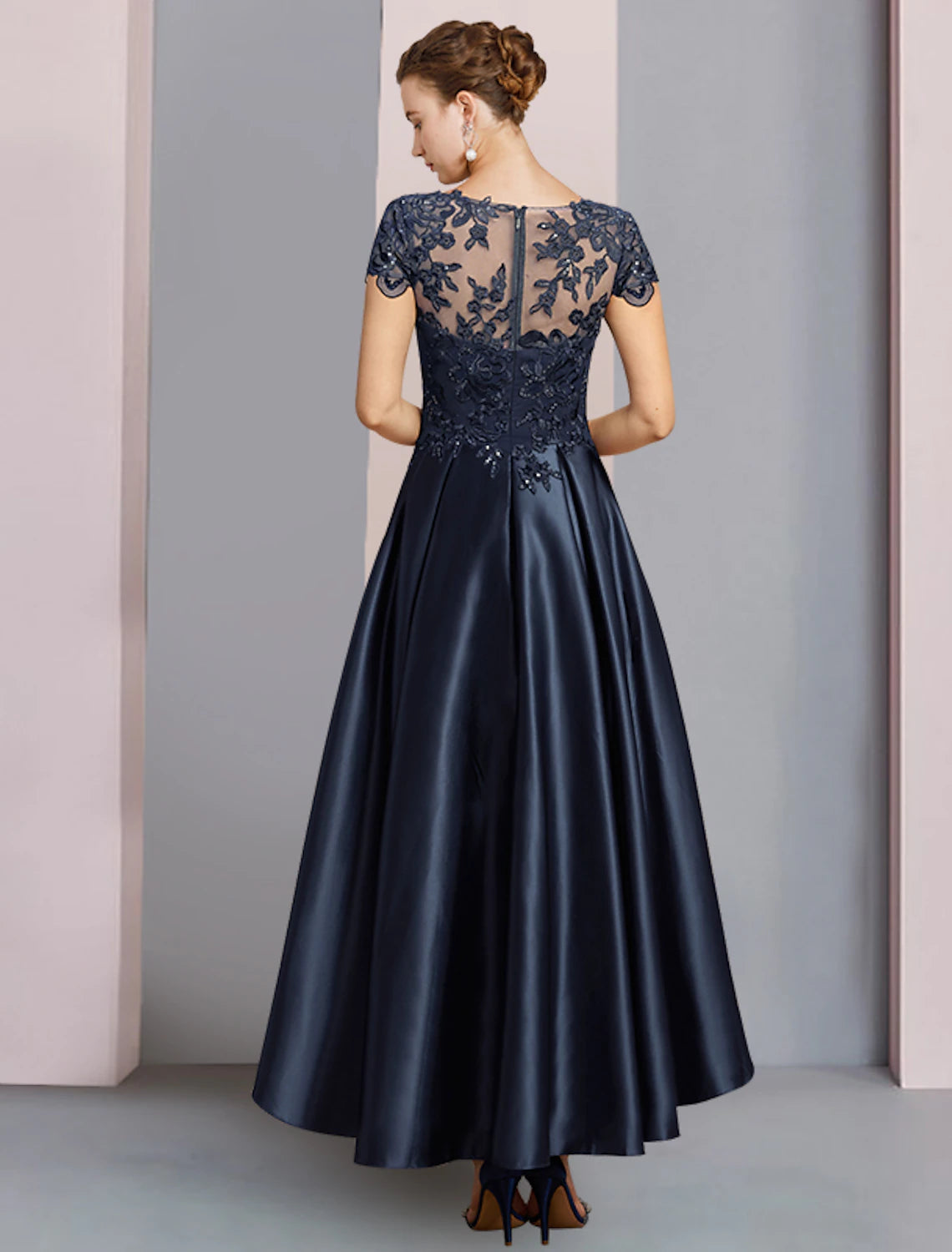 Full view of A-Line tea length gown with scoop neck and half sleeves.