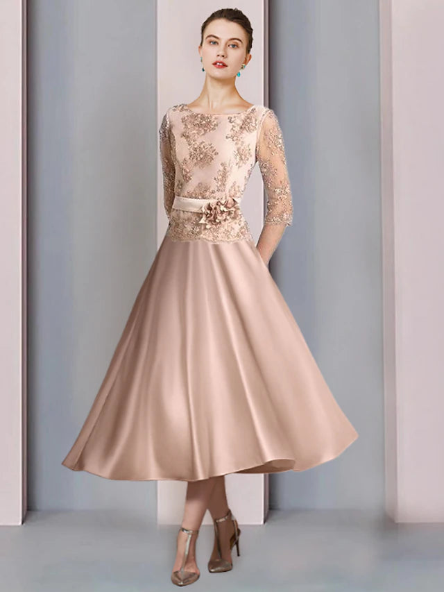 Elegant A-Line Mother of the Bride dress with scoop neck and half sleeves.