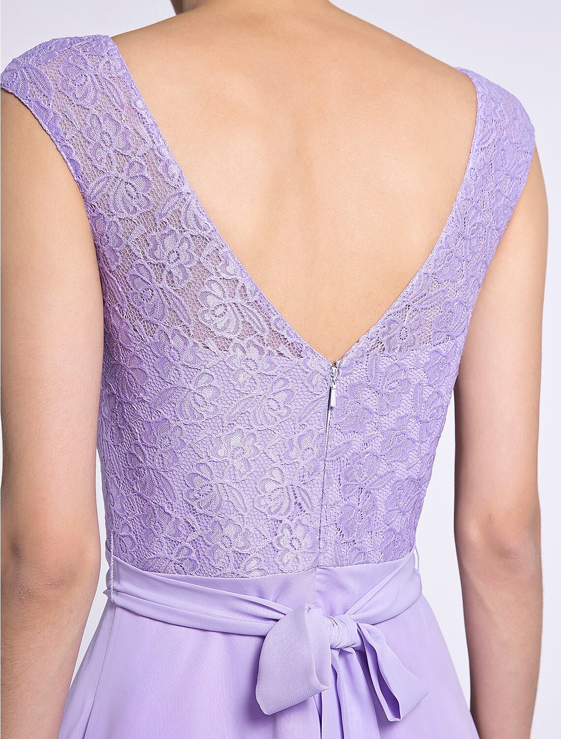 Back view of A-Line bridesmaid dress with knee length hem.
