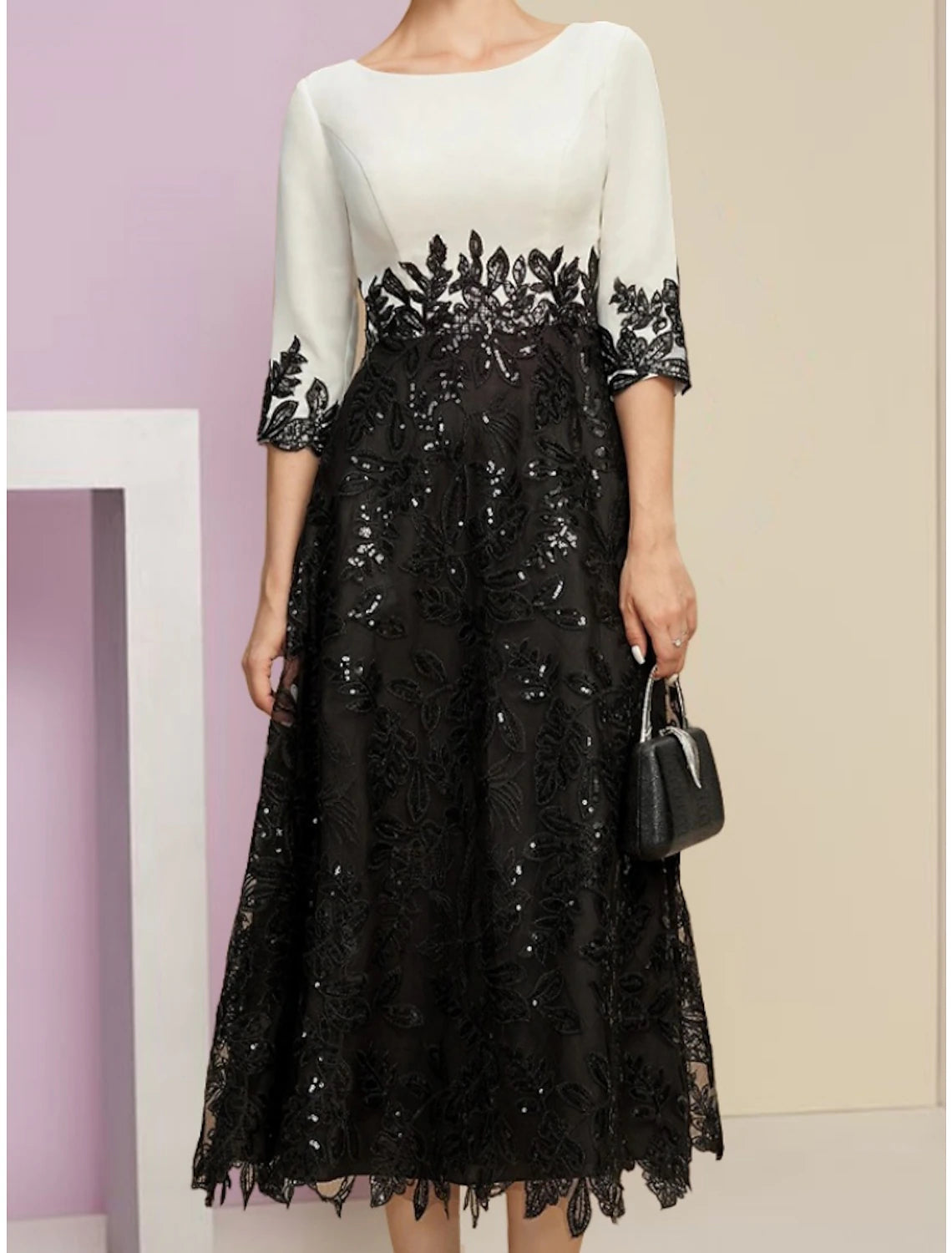Back view of A-line mother of the bride dress featuring ruching and stretch chiffon fabric.