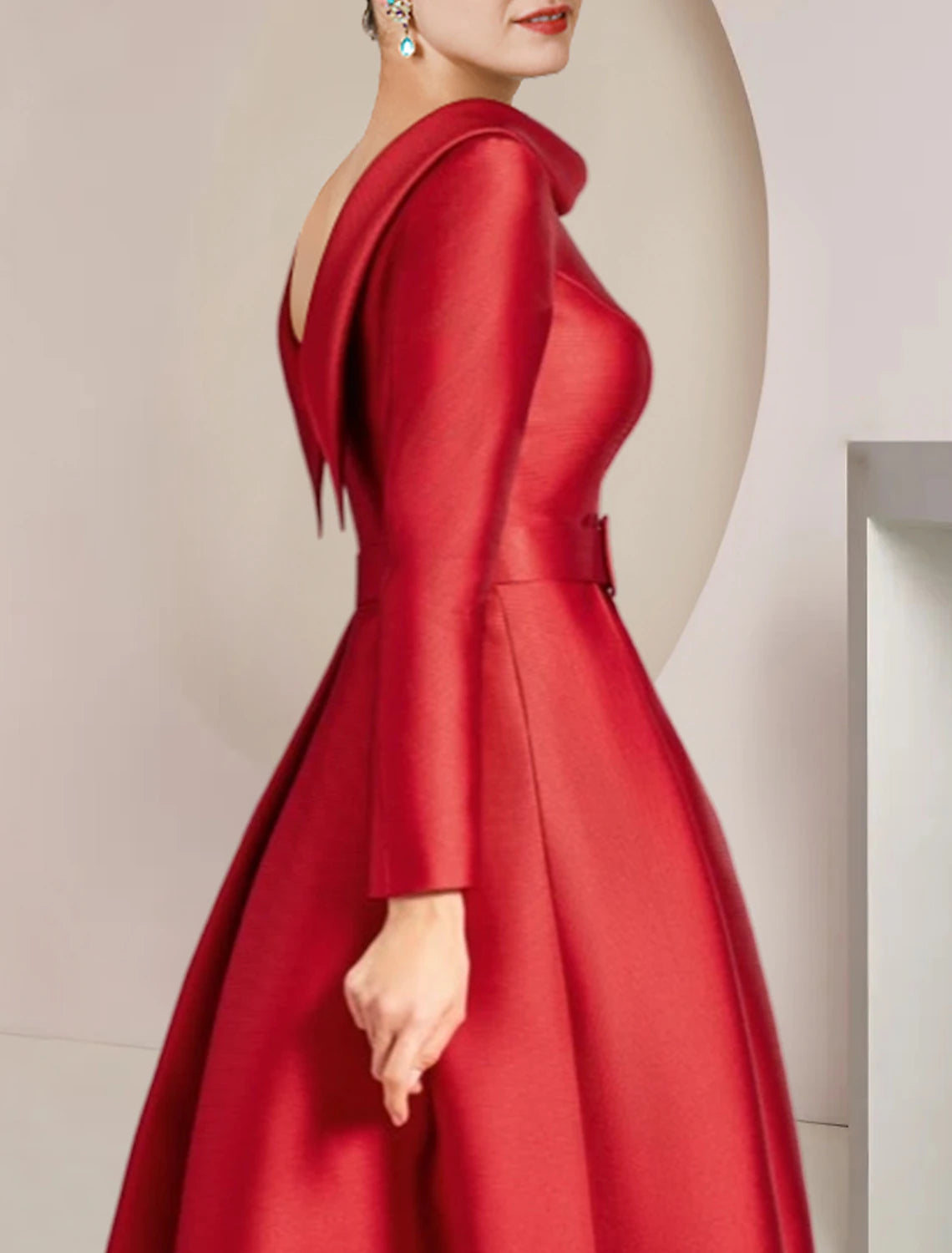 Back view of the long sleeve A-line dress, suitable for formal events.