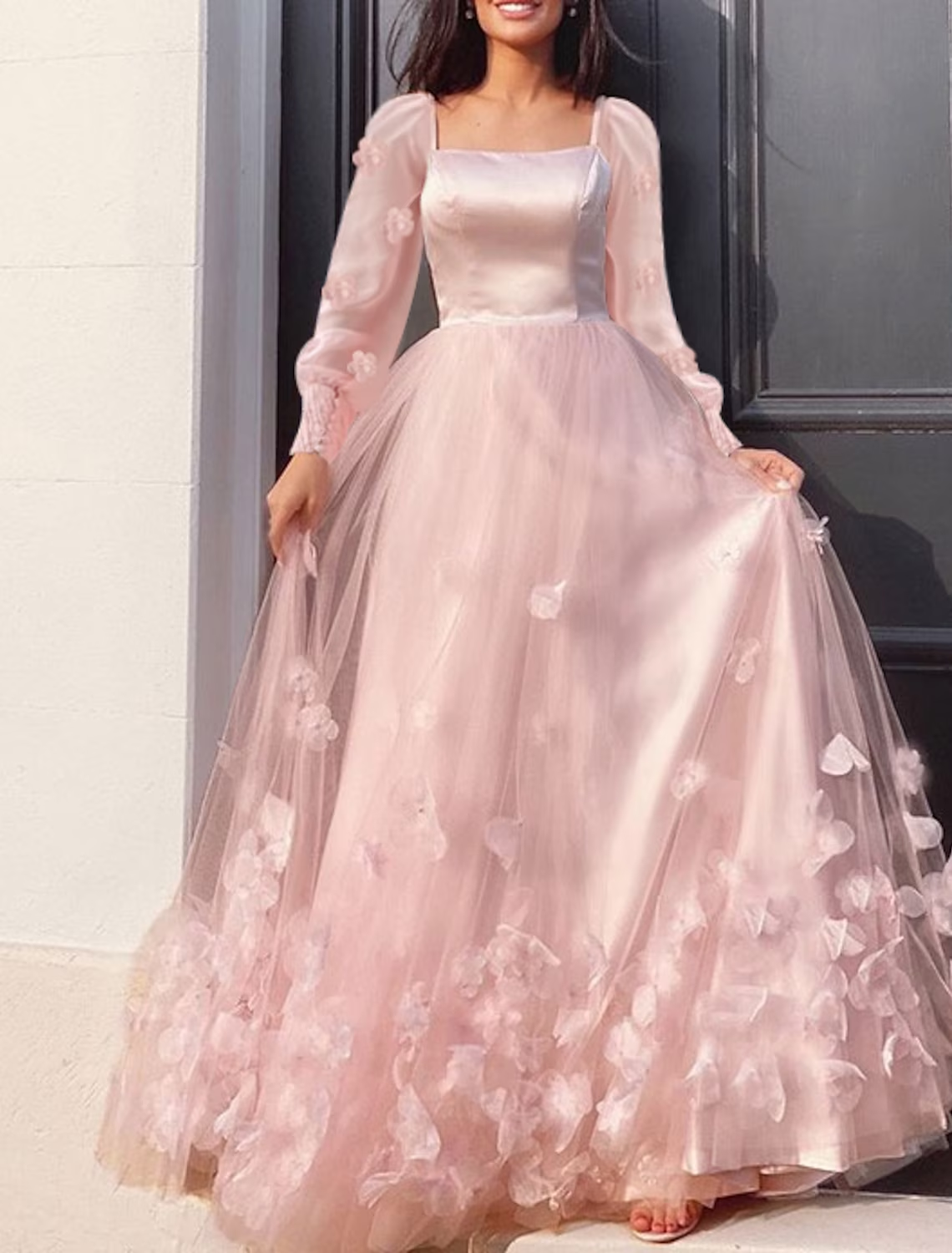 Back view of the A-line tulle maxi dress with intricate appliques.