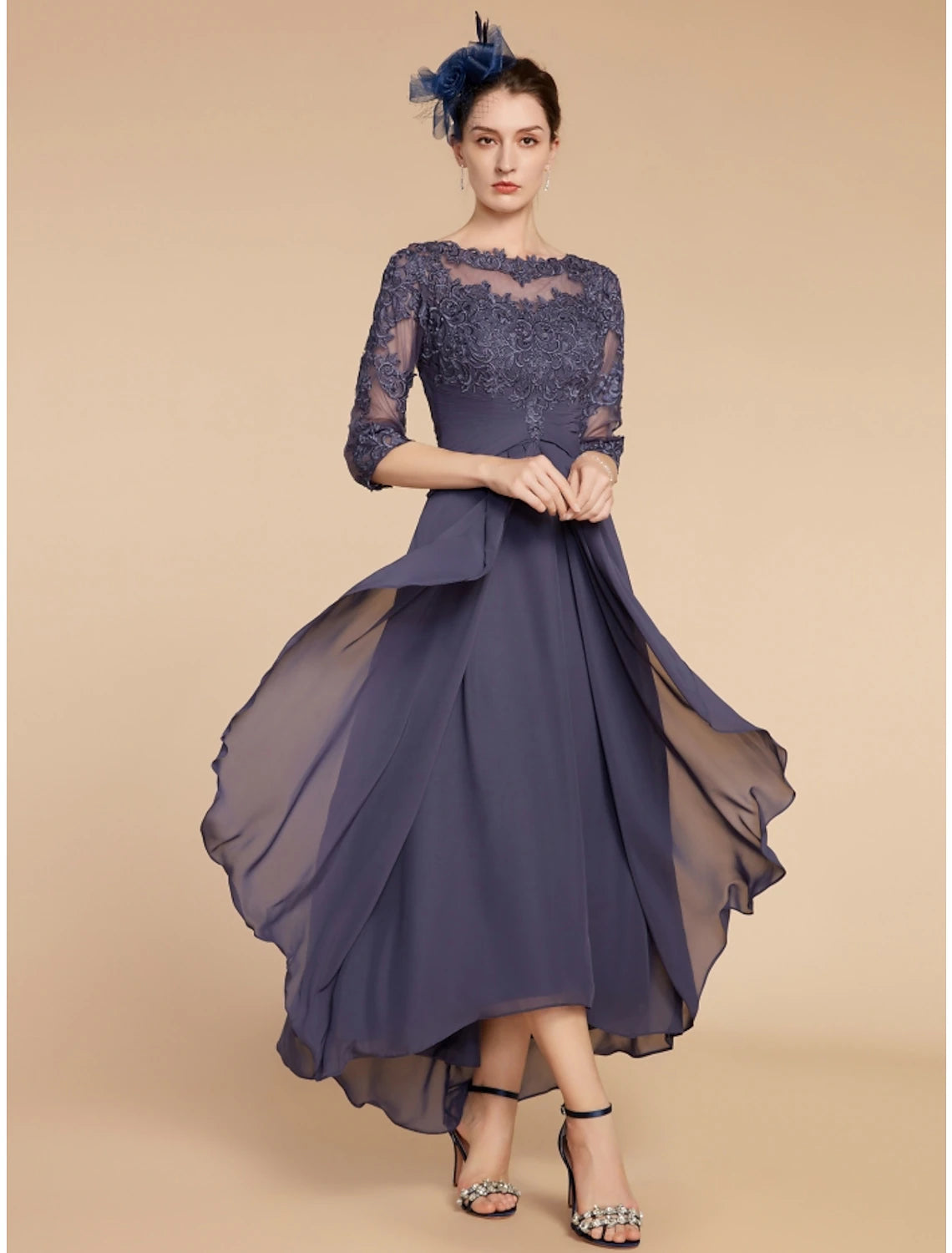 Elegant A-line mother of the bride dress with scoop neck and 3/4 sleeves.