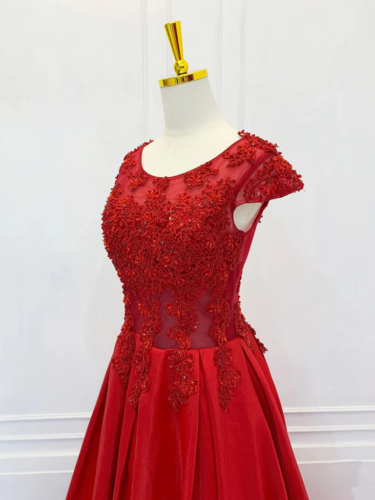 Close-up of delicate lace detail on the prom dress.