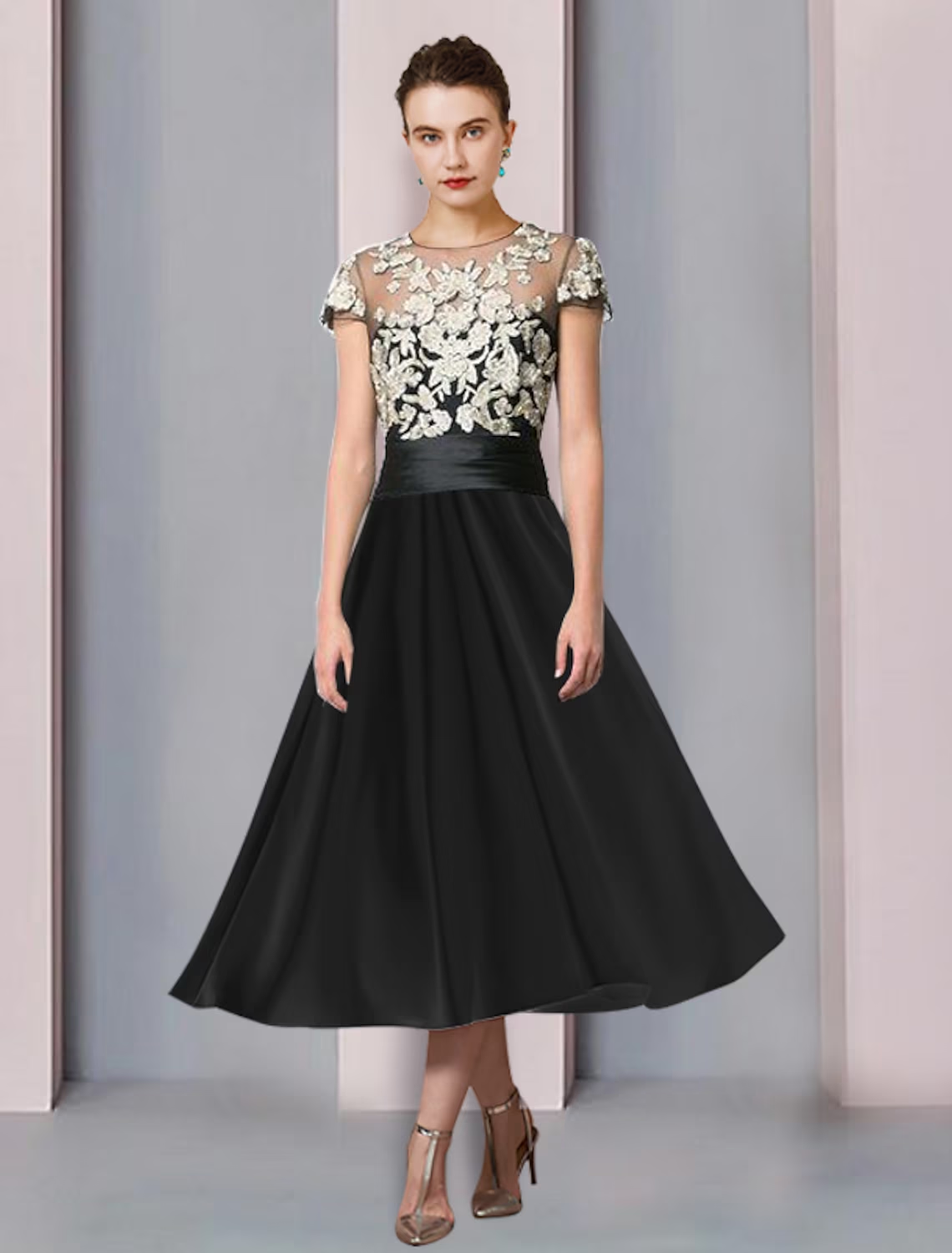 Woman wearing an elegant A-Line Mother of the Bride dress with scoop neck, short sleeves, and lace pleats.