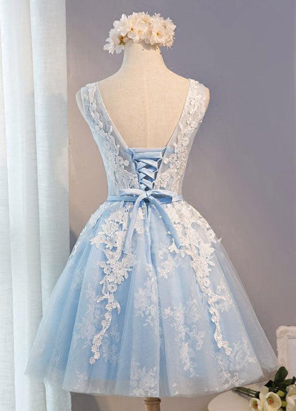 Back view of a short tulle homecoming dress with delicate lace details.