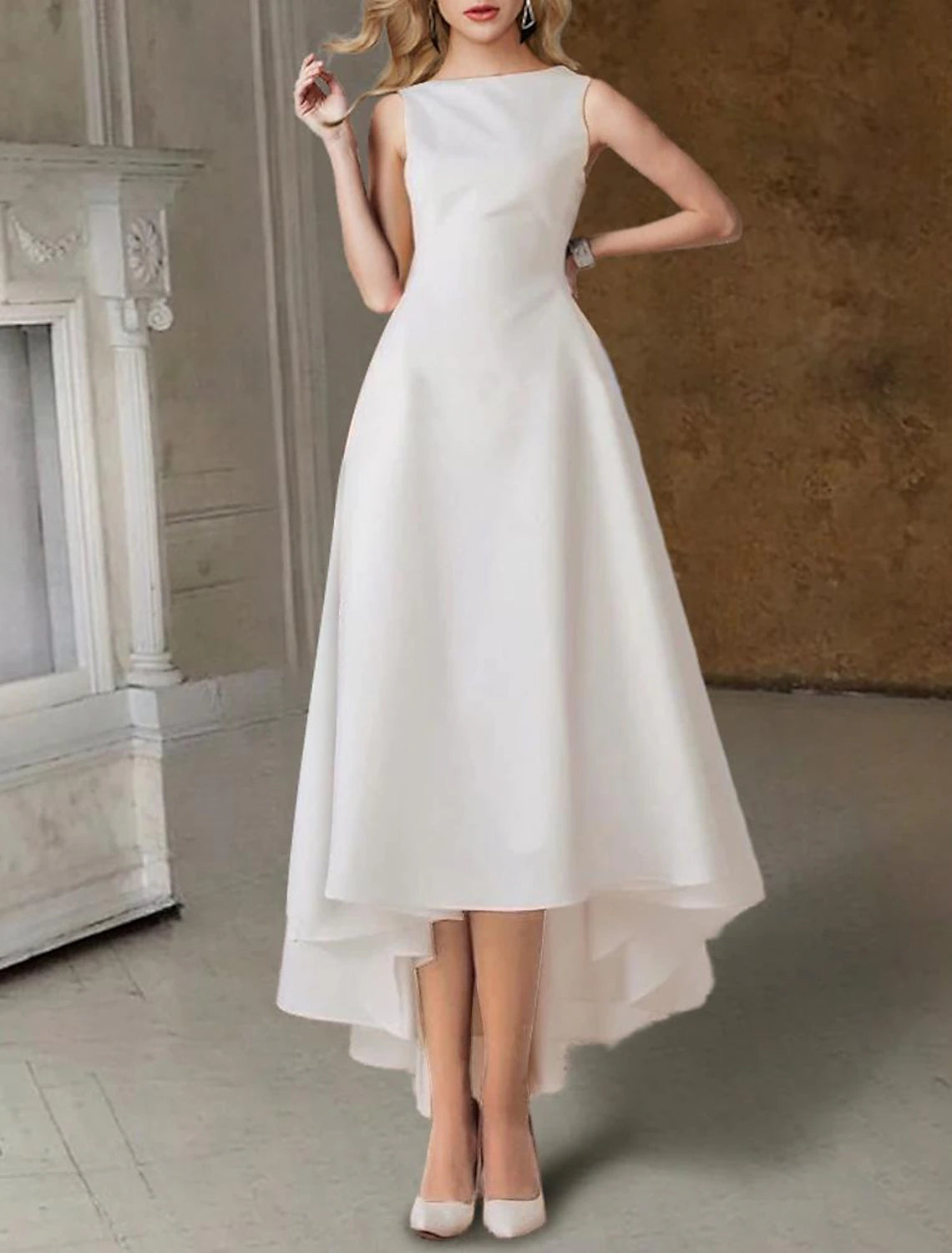 White A-line wedding dress with scoop neck, sleeveless design, tea length, and pleats, shown from a side view.