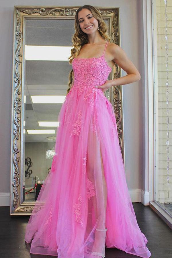 Hot pink A-line prom dress with scoop neck and high leg split.