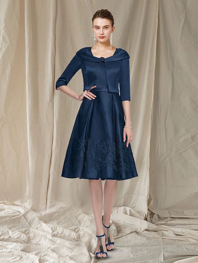 Elegant A-line two-piece Mother of the Bride dress with short jacket.