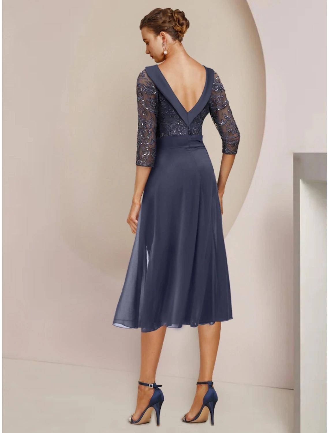A-line sequin chiffon dress for Mother of the Bride, with scoop neckline and 3/4 length sleeves.