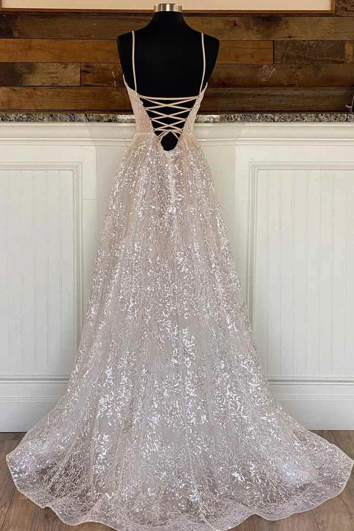 Full view of a shimmering A-line sequin lace formal gown.