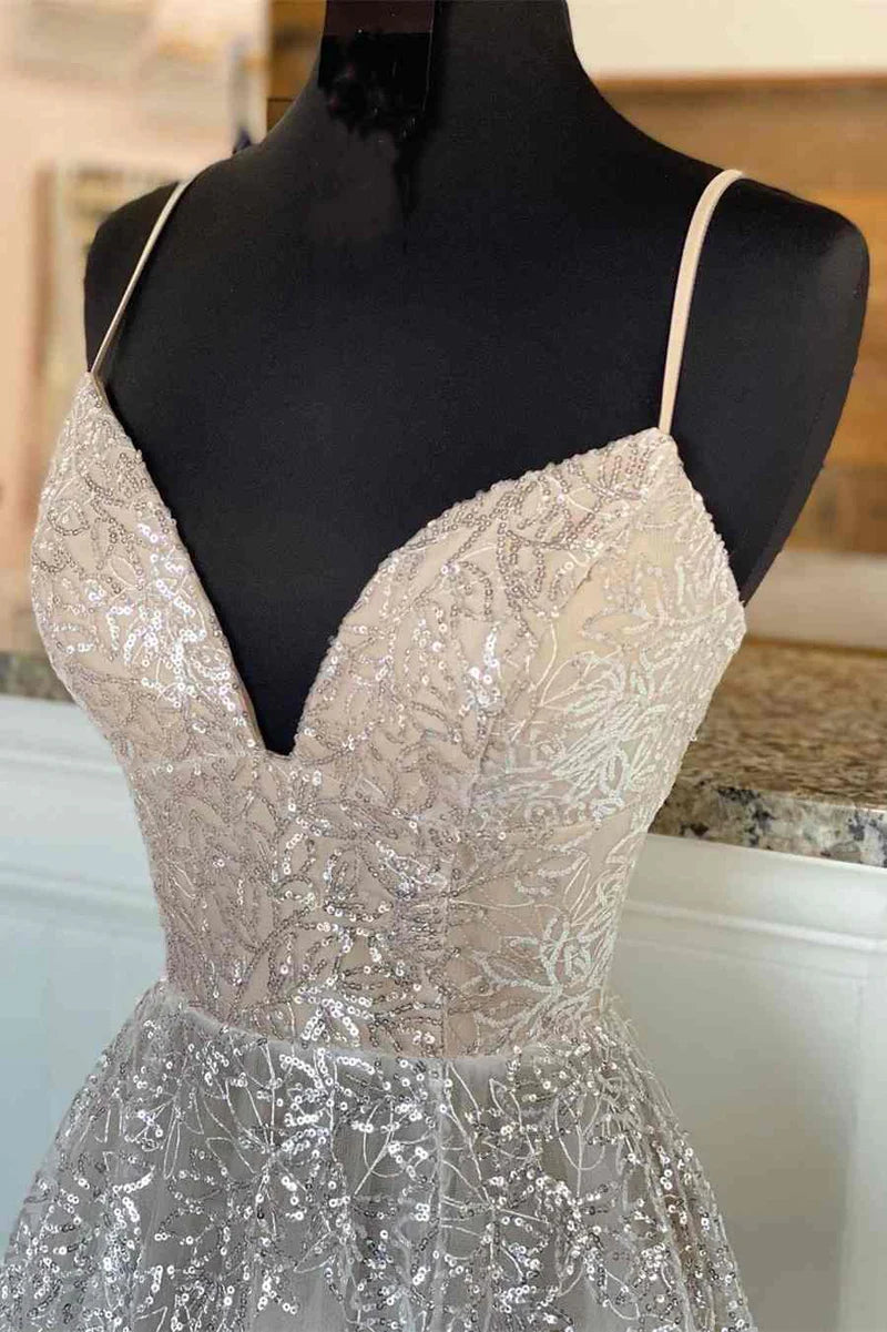 Close-up of sequin and lace embellishments on an A-line dress.