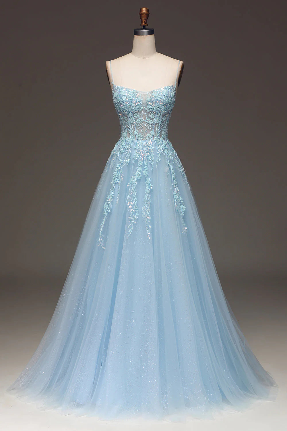 Light blue A-line sequin prom dress with spaghetti straps and appliques.