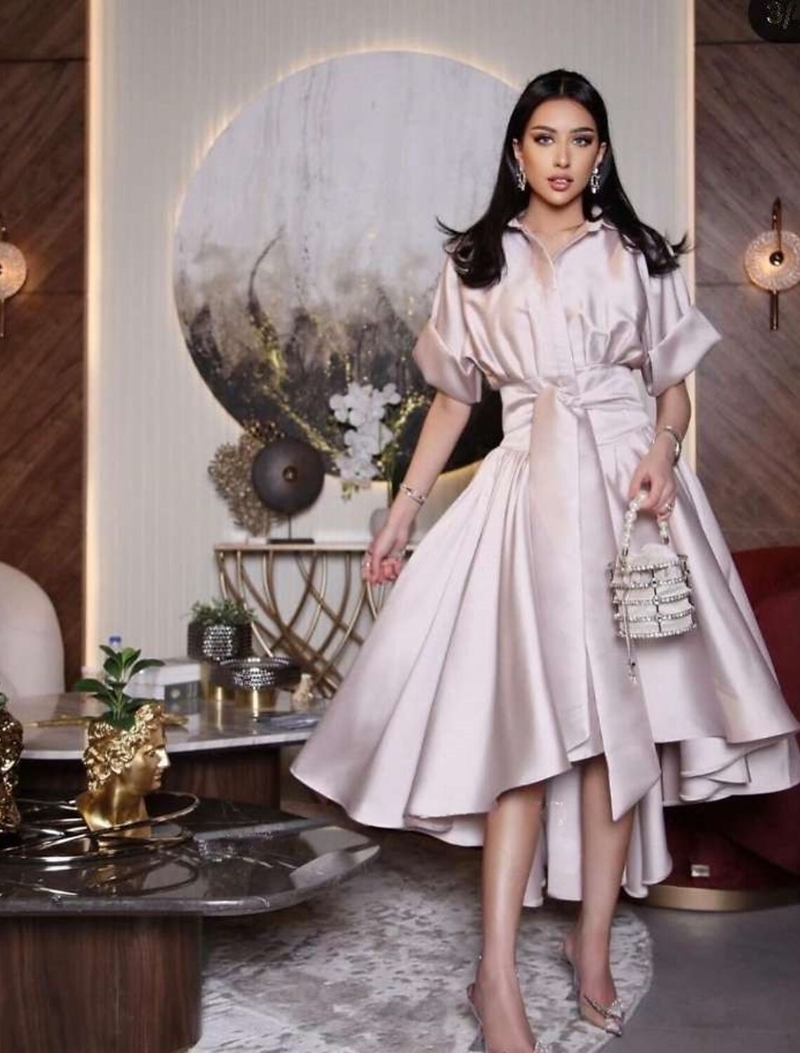 Elegant A-line satin evening gown with shirt collar and short sleeves.