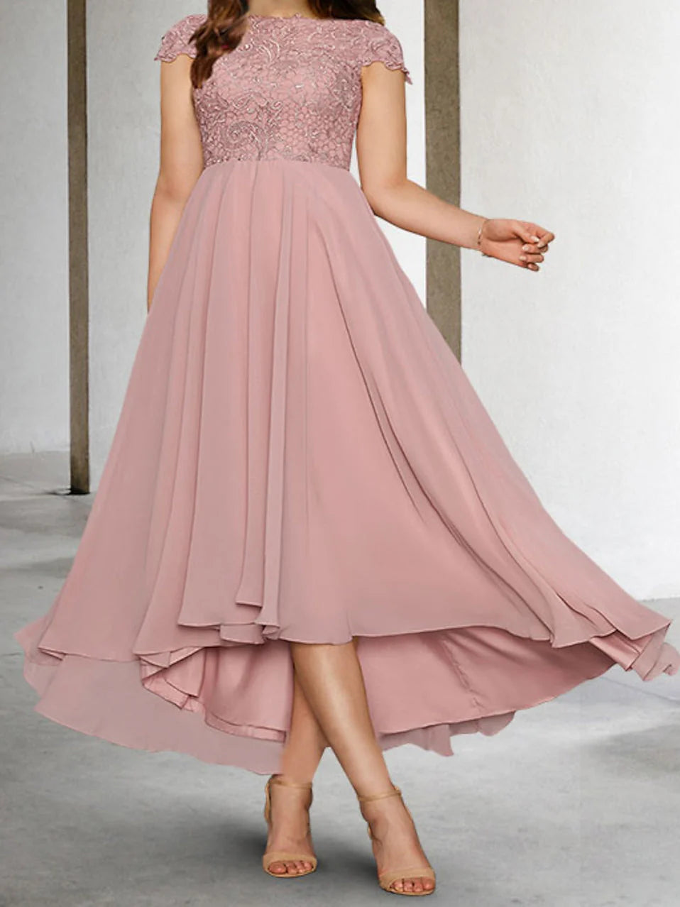 Elegant A-line Mother of the Bride dress with short applique sleeves.